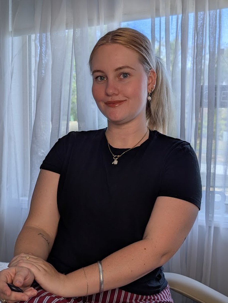 April, founder of April Mae Beauty Co, in her studio